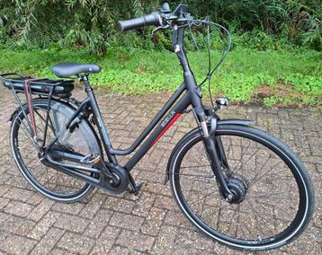 Zeer nette mat zwarte elektrische Stella damesfiets, 56cm✅️ beschikbaar voor biedingen