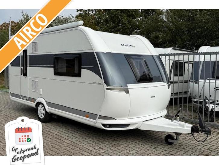 Hobby De Luxe 460 SFF Incl. Airco Mover Luifel, Caravans en Kamperen, Caravans, Bedrijf, tot en met 3, Treinzit, Hobby, Lengtebed