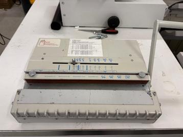 Hand bedienbare inbindmachine beschikbaar voor biedingen