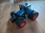 Trekker. Bruder trekker. New holand trekker.bruder, Hobby en Vrije tijd, Modelbouw | Radiografisch | Auto's, Ophalen, Zo goed als nieuw