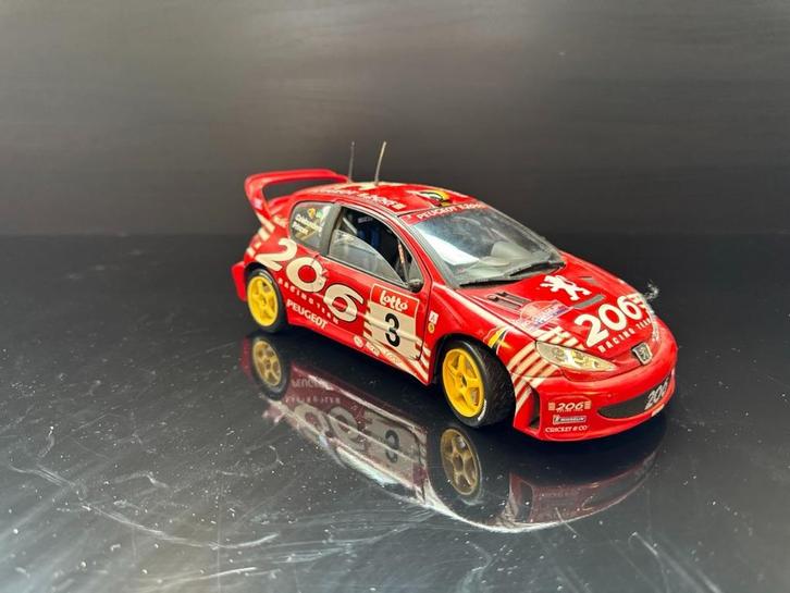 Peugeot 206 WRC – Solido 1:18 Schaalmodel, Hobby en Vrije tijd, Modelauto's | 1:18, Zo goed als nieuw, Auto, Solido, Ophalen of Verzenden