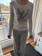 Shirt lange mouw strass embleem maat XS nieuwstaat (1), Beige, Ophalen of Verzenden, Zo goed als nieuw, Lange mouw