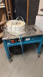 Halfautomatische omsnoermachine, Ophalen