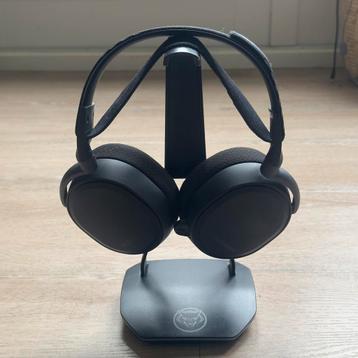 Headset + headset houder beschikbaar voor biedingen