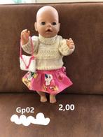 Poppenkleertjes baby pop set. Opbrengst KiKa., Ophalen, Nieuw, Babypop