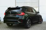 BMW X1 sDrive20i High Executive M Sport Automaat / Panoramad, Auto's, BMW, 1525 kg, Zwart, 156 pk, Stoelverwarming