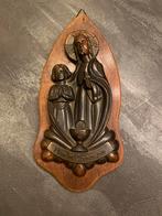 Bronzen beeld op hout. Bieden, Ophalen