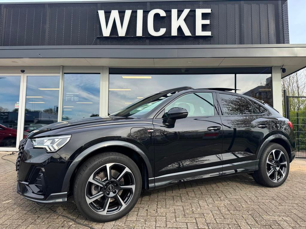 Audi Q3 Sportback 45 TFSI e S Edition SONOS Pano Camera Trek, Auto's, Adaptive Cruise Control, Gebruikt, Zwart, Hybride Elektrisch/Benzine