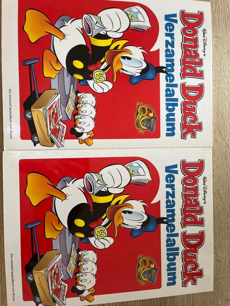 Donald Duck Verzamelalbum 60 jaar jubileum (2 stuks) sticker, Meerdere stripboeken, Ophalen of Verzenden, Zo goed als nieuw