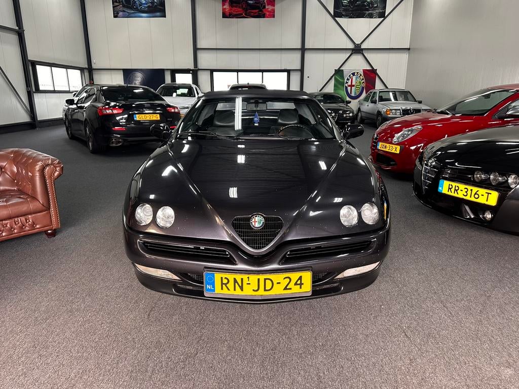 Alfa Romeo Spider 2.0 Twin Spark 16V 1997 Zwart, Auto's, Alfa Romeo, Voorwielaandrijving, Zwart, Cabriolet, Spider