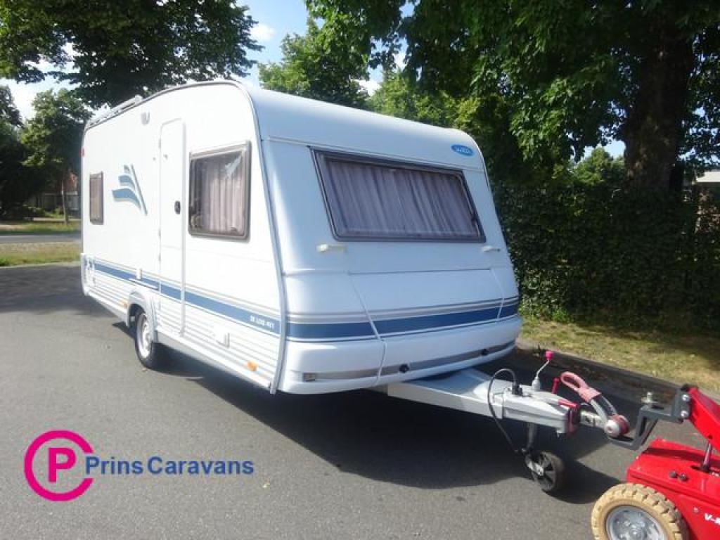 Wilk Blue star 470 Met Frans Bed en Rondzit #NIEUWSTAAT#, Caravans en Kamperen, Caravans, Schokbreker, Bedrijf, Wilk, Tot en met 4