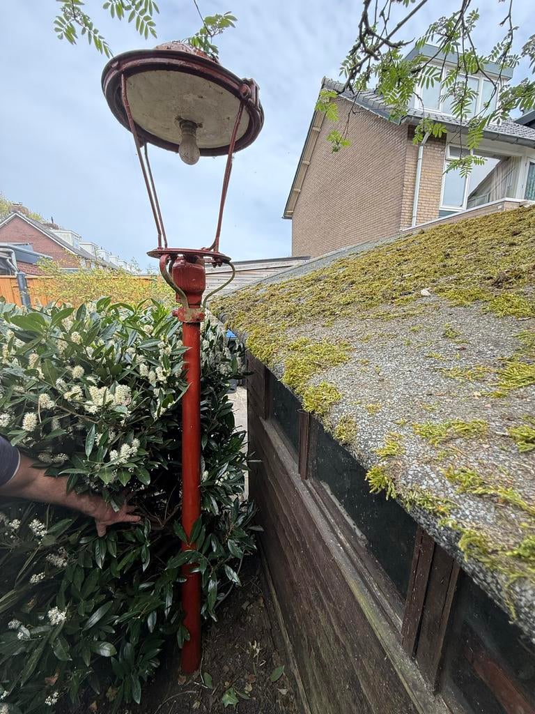 Antieke lantaarnpaal - gietijzeren straatlantaarn, Ophalen