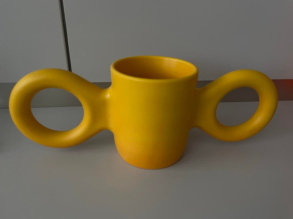 Oorbeker Richard Hutten, oranje/geel, Ophalen of Verzenden