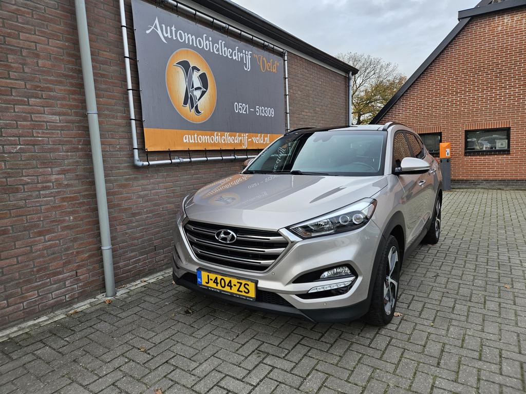 Hyundai Tucson 1.6 T-GDi Premium 4WD (bj 2016, automaat), Gebruikt, 4 cilinders, Wit, Leder