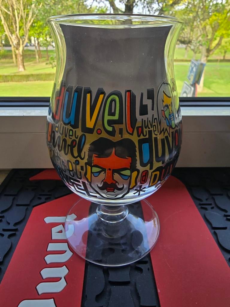 Duvel glas Denis Meyers, Verzamelen, Biermerken, Ophalen of Verzenden, Zo goed als nieuw, Glas of Glazen, Duvel