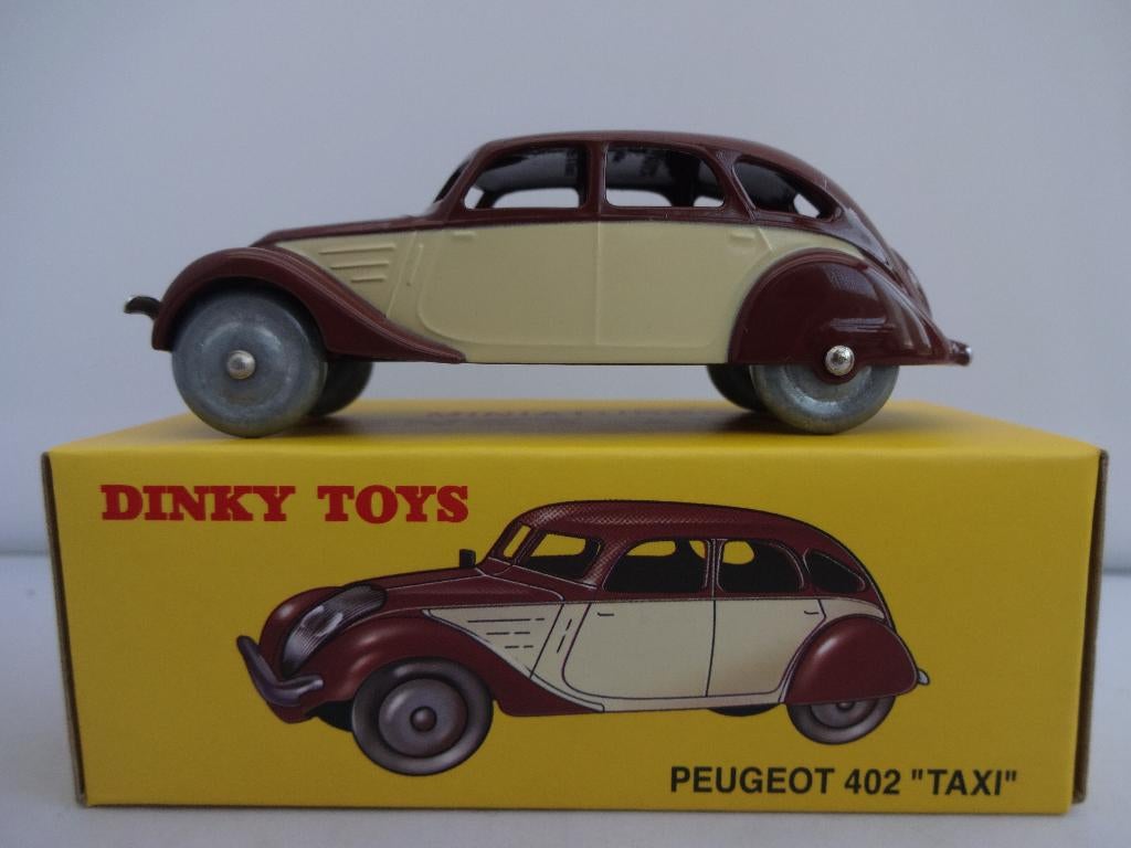 Peugeot 402 TAXI geel/bruin nr: 24L van Dinky Toys 1:43, Ophalen of Verzenden, Nieuw, Auto, Dinky Toys
