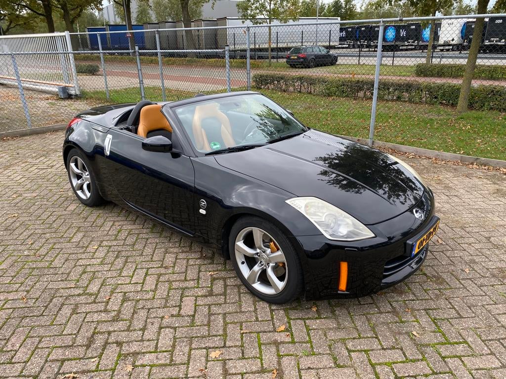 Nissan 350Z cabriolet 2006, Achterwielaandrijving, Zwart, Leder en Stof, Zwart