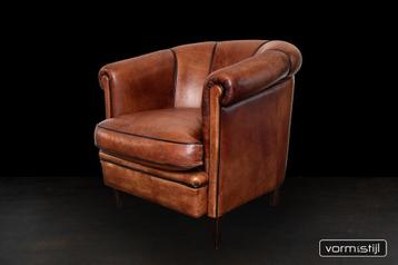 Clubchair England in antique schaapsleer beschikbaar voor biedingen