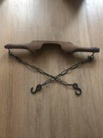 Antiek houten juk, Ophalen