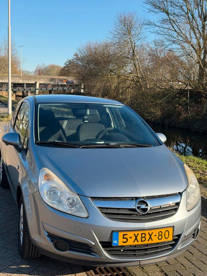 Opel Corsa 1.0 12V 3D 2009 Grijs, Auto's, Opel, Particulier, Corsa, Benzine, B, Hatchback, Handgeschakeld, Geïmporteerd, Zilver of Grijs