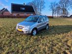 Suzuki Ignis 1.5 5D AUT 2004 Grijs, Auto's, Suzuki, Stof, 4 cilinders, Ignis, 950 kg