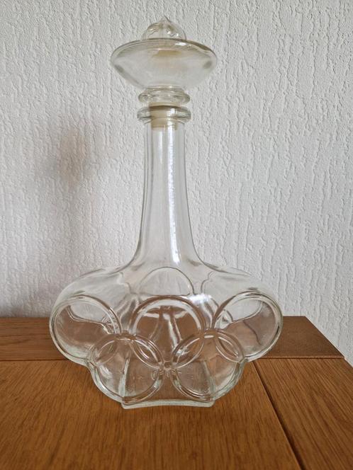 Glazen Karaf Olympische Spelen, Ringen en Olympisch Vuur, Antiek en Kunst, Antiek | Glas en Kristal, Ophalen of Verzenden