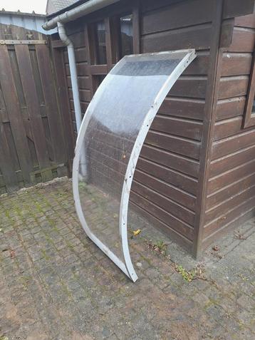 Deurluifel kunsstof met aluminium frame. Deur luifel beschikbaar voor biedingen