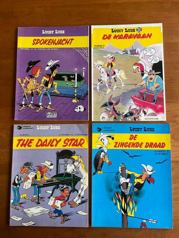 4 Lucky Luke Albums - Spokenjacht, Karavaan, Daily Star..., Boeken, Stripboeken, Gelezen, Meerdere stripboeken, Ophalen of Verzenden