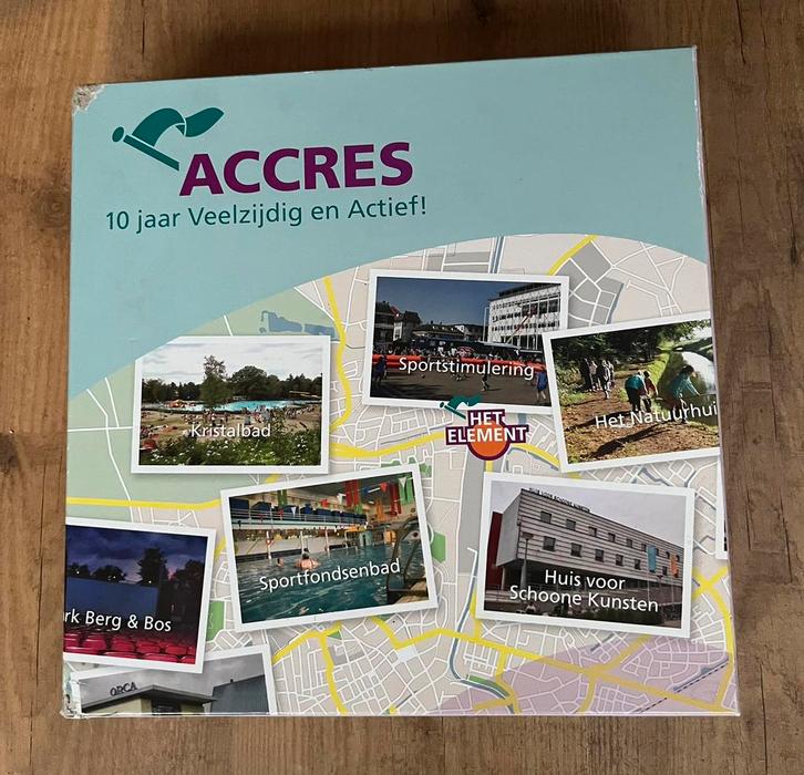 Accres spel met geld uit 2009!, Hobby en Vrije tijd, Gezelschapsspellen | Bordspellen, Zo goed als nieuw, Ophalen of Verzenden