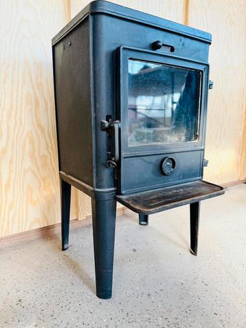Charmante houtkachel merk Andersen beschikbaar voor biedingen