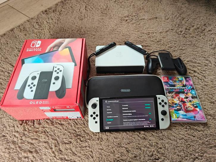 Nintendo Switch OLED, Spelcomputers en Games, Spelcomputers | Nintendo 2DS en 3DS, Zo goed als nieuw, Wit, Met games, Met beschermhoes of tas
