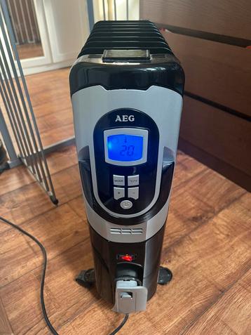 AEG oliegevulde radiator met digitale thermostaat beschikbaar voor biedingen