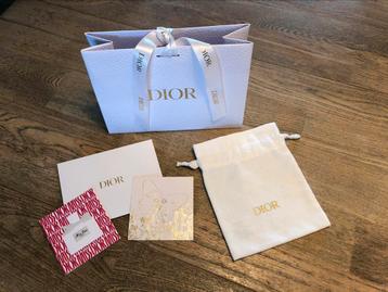 Dior cadeau-tasje, katoenen koordzakje en 2 parfumkaartjes. beschikbaar voor biedingen