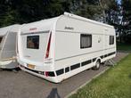 Dethleffs camper 560 RET enkele bedden rondzit en douche, Schokbreker, Rondzit, 1250 - 1500 kg, 2 aparte bedden