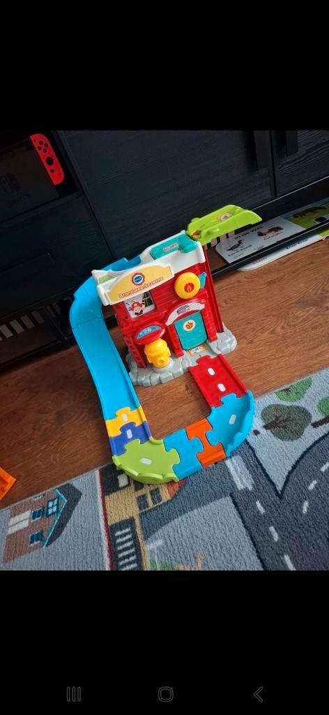 VTech Toet Toet Auto Brandweerkazerne - vliegveld, Kinderen en Baby's, Speelgoed | Speelgoedvoertuigen, Gebruikt, Ophalen of Verzenden