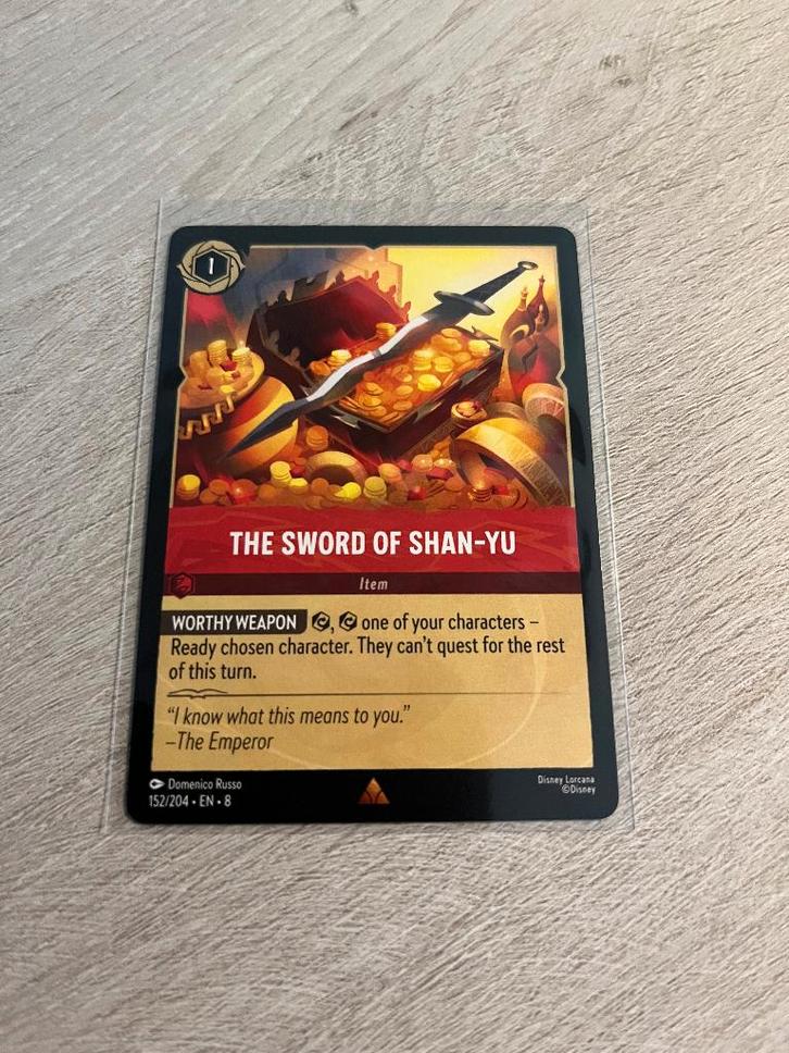 The Sword of Shan-Yu 152/204 | Reign of Jafar | Lorcana, Hobby en Vrije tijd, Verzamelkaartspellen | Overige, Nieuw, Losse kaart