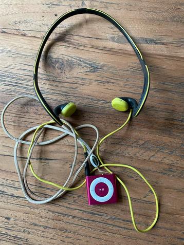 Roze iPod Shuffle met oortjes beschikbaar voor biedingen