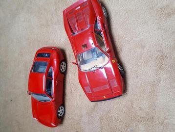 Te koop een porsche en een ferrari schaal 1 op 18 beschikbaar voor biedingen