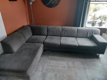 Te koop grijze hoekbank  beschikbaar voor biedingen