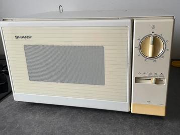 Sharp magnetron eenvoudig te bedienen beschikbaar voor biedingen