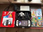 Nintendo switch oled + accessoires en games, Spelcomputers en Games, Spelcomputers | Nintendo Switch, Switch OLED, Met games, Met 2 controllers