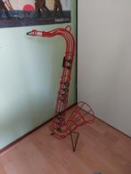 Rode kunststof saxofoon - decoratie voor muziekliefhebber, Ophalen, Gebruikt