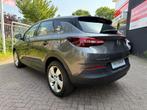 Opel Grandland X 1.6 Turbo Plug-In Hybrid 4x4 Business Elega, Auto's, Automaat, Stof, Gebruikt, Zwart