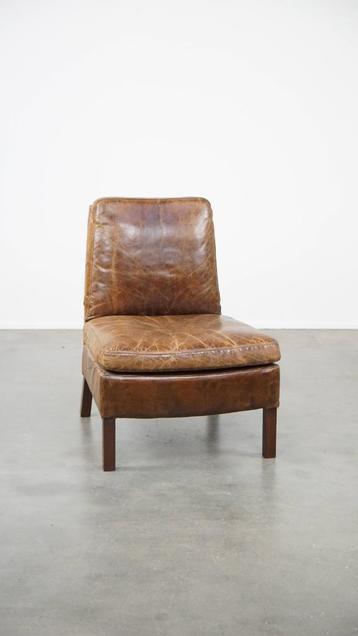 Rundleren fauteuil/lounge chair met een uniek design beschikbaar voor biedingen