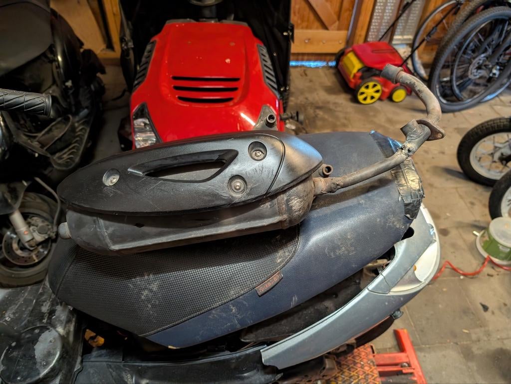 Zip iGET 4T uitlaat (2018) - moet gelast worden, Fietsen en Brommers, Brommeronderdelen | Scooters, Ophalen of Verzenden, Gebruikt