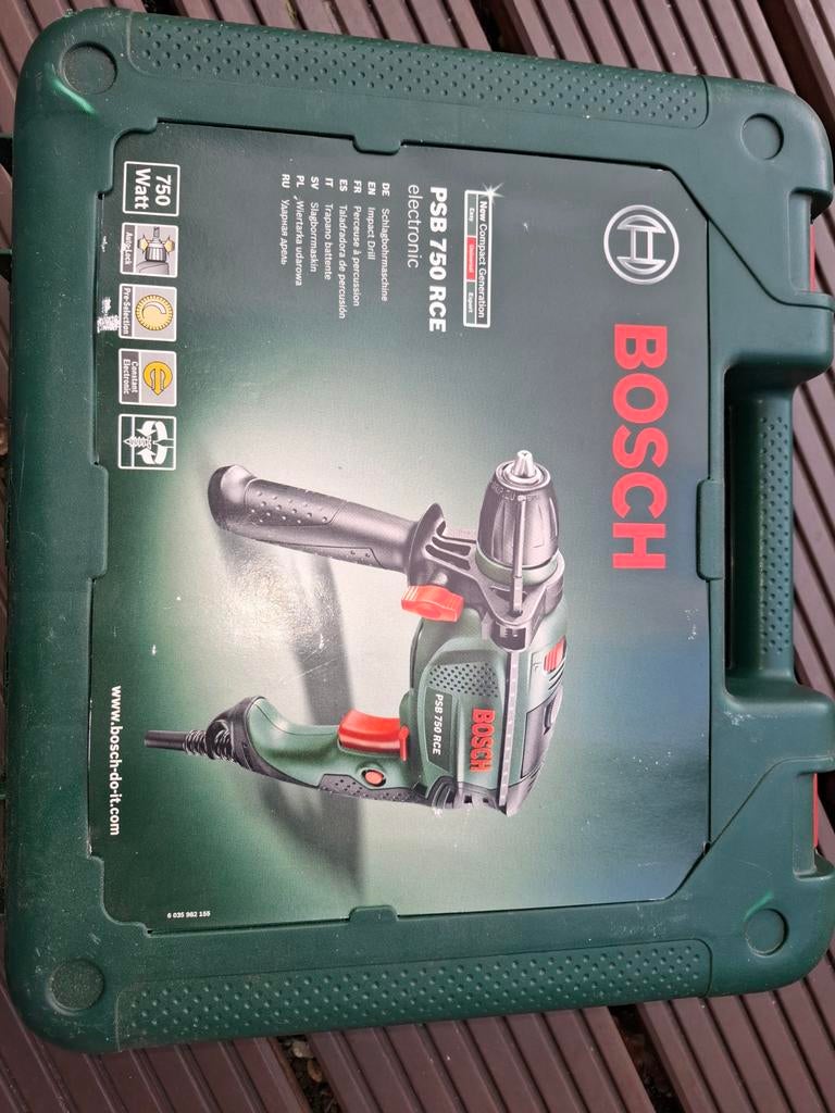 Bosch PSB 750 RCE Klopboormachine met koffer, Boormachine, Ophalen of Verzenden, Variabele snelheid, Gebruikt