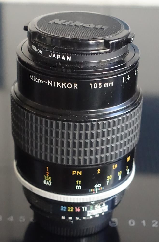 Nikon micro Nikkor 105 mm F4 en separaat een PN-11 ring, Ophalen of Verzenden, Gebruikt, Macrolens