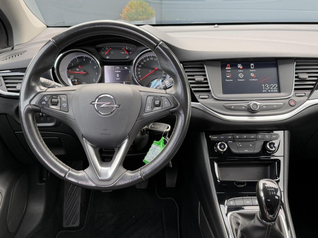 Opel Astra 1.2 Blitz Elegance 1e Eigenaar,Navi,Camera,131pk,, Auto's, Voorwielaandrijving, 1350 kg, Stof, Gebruikt