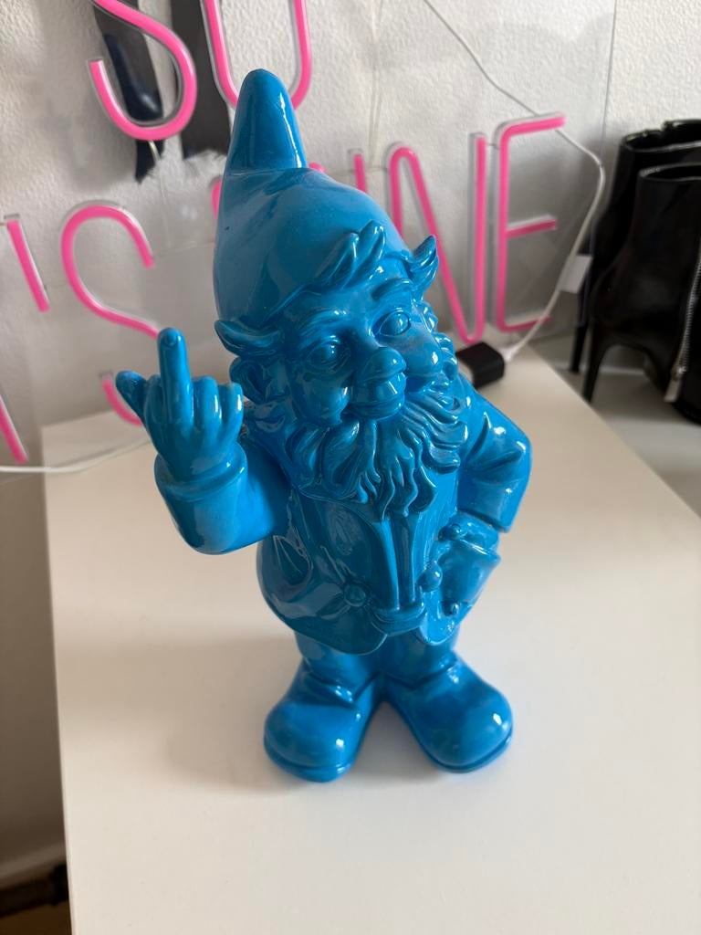 Blauwe kabouter (middelvinger), Ophalen