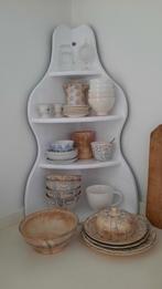 Hoekkastje (nuzzelspul), Ophalen